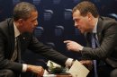 U.S. President Barack Obama, left, chats with Russian President Dmitry Medvedev during a bilateral meeting at the Nuclear Security Summit in Seoul, South Korea, Monday, March, 26, 2012. (AP Photo/Pablo Martinez Monsivais)