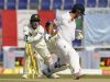 Pakistan's Akmal attempts unsuccessfully to stump England's Cook during the second cricket test match in Abu Dhabi