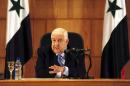 In this photo released by the Syrian official news agency SANA, Syrian Foreign Minister Walid al-Moallem speaks during a press conference, giving the first public comments by a senior Assad official on the threat posed by the Islamic State group, in Damascus, Syria on Monday, August 25, 2014. Al-Moallem warned the U.S. not to conduct airstrikes inside Syria against the Islamic State group without Damascus' consent, saying any such attack would be considered an aggression. Al-Moallem also said that Syria is ready to work with regional states and the international community amid the onslaught of Islamic militants there and in Iraq, adding that the Syrian government is a crucial partner in the war on terror. (AP Photo/SANA)