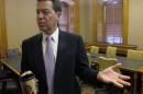 Kansas Gov. Sam Brownback discusses the U.S. Supreme Court decision upholding the federal health care overhaul, Thursday, June 28, 2012, at the Statehouse in Topeka, Kan. Brownback opposes the 2010 federal law and is surprised and disappointed by the ruling. (AP Photo/John Hanna)