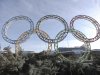 Olympic rings for the 2014 Winter Olympics are installed in the Black Sea resort of Sochi, southern Russia, late Tuesday, Sept. 25, 2012.  With the Winter Olympics a year away, IOC President Jacques Rogge praised Sochi organizers on Wednesday, Feb. 6, 2013 and defended the $51 billion price tag. (AP Photo/Ignat Kozlov))