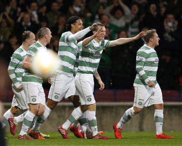 Celtic&#39;s Henderson celebrates his goal with teammates Commons and Van Dijk during their Scottish Premier League soccer match against Partick Thistle at Firhill Stadium