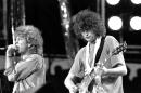 FILE - In this July 13, 1985 file photo, singer Robert Plant, left, and guitarist Jimmy Page of the British rock band Led Zeppelin perform at the Live Aid concert at Philadelphia's J.F.K. Stadium. Generations of aspiring guitarists have tried to copy the riff from Led Zeppelin's 