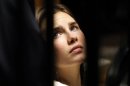 Amanda Knox, the U.S. student convicted of killing her British flatmate in Italy in 2007, looks on during a trial session in Perugia