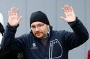 Rezaian one of the U.S. citizens recently released from detention in Iran poses to media outside the Emergency Room of the LRMC in the southwestern town of Landstuhl