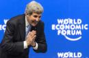 U.S. Secretary of State John Kerry bows to someone after his speech during a panel session at the World Economic Forum, in Davos, Switzerland, Friday, Jan. 23, 2015. (AP Photo/Keystone, Laurent Gillieron)