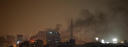 Smoke is seen over Ramses Square in Cairo