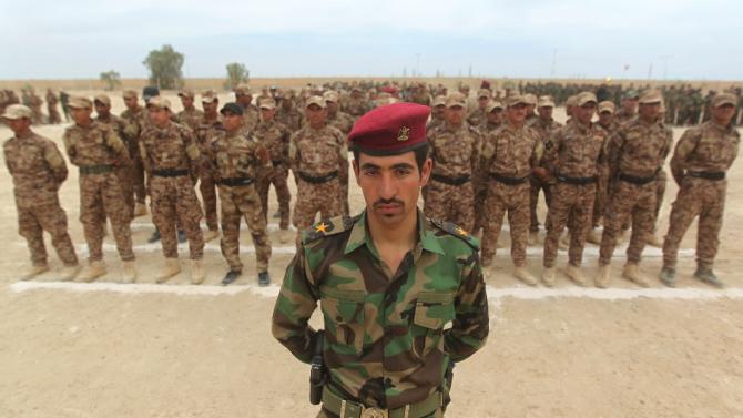 Iraqi Sunni volunteers from the Anbar province take part in their first training session at a training base in Amriyat al-Fallujah, on May 8, 2015