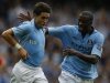 Manchester City's Nasri celebrates with Toure after scoring his side's third goal during their English Premier League soccer match against Southampton in Manchester
