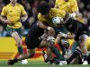 Australia Wallabies' Samo is tackled by New Zealand All Blacks' Weepu during their Rugby World Cup semi-final match in Auckland