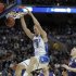 FILE - Duke's Mason Plumlee (5) dunks the ball past Albany's Luke Devlin (11), Sam Rowley (14) and Jacob Iati (0) during the second half of a second-round game of the NCAA college basketball tournament, in this March 22, 2013 file photo taken in Philadelphia. (AP Photo/Michael Perez, File)
