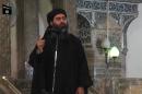 The leader of the Islamic State (IS) jihadist group, Abu Bakr al-Baghdadi, aka Caliph Ibrahim, addressing Muslim worshippers at a mosque in the militant-held northern Iraqi city of Mosul, July 5, 2014