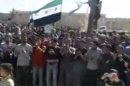 This image made from amateur video and released by Shaam News Network Thursday, March 15, 2012 purports to show a protest in Idlib, Syria. (AP Photo/Shaam News Network via APTN) THE ASSOCIATED PRESS CANNOT INDEPENDENTLY VERIFY THE CONTENT, DATE, LOCATION OR AUTHENTICITY OF THIS MATERIAL. TV OUT