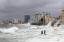 Waves crash against Havana's seafront boulevard 'El Malecon'