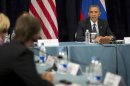 President Barack Obama participates in a "Civil Society Roundtable," Friday, Sept. 6,2013, in St. Petersburg, Russia. At left is Igor Kochetkov chairman of the Russian LGBT Network. (AP Photo/Pablo Martinez Monsivais)