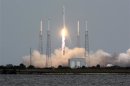 The SpaceX Falcon 9 rocket with the Dragon capsule, lifts off from the Cape Canaveral Air Force Station on a second resupply mission to the International Space Station in Cape Canaveral