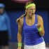 Victoria Azarenka of Belarus reacts after winning a point against Russia's Maria Sharapova during the women's singles final at the Australian Open tennis championship in Melbourne, Australia, Saturday, Jan. 28, 2012. (AP Photo/Andrew Brownbill)
