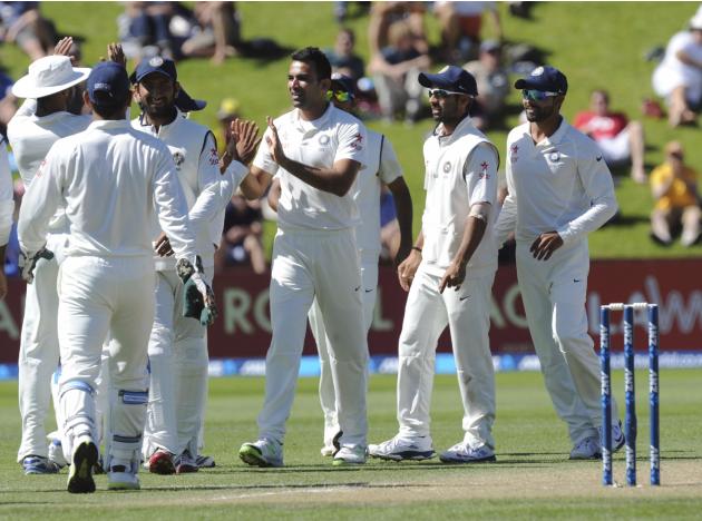 India&acirc;€™s Zaheer Khan, center, celebrates with teammates after dismissing New Zealand&acirc;€™s Kane Williamson for 7 on the third day of the second cricket test at Basin Reserve in Wellington, New Zealand, Sun