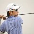 Choi Jin-ho of South Korea watches his shot during the third round of the Volvo China Open at Binhai Lake Golf Club in Tianjin