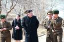 North Korean leader Kim Jong-Un (C) leads an inspection while Kim Yo-Jong (2nd L), vice department director of the Central Committee of the Worker's Party of Korea (WPK) and the younger sister of Kim Jong-Un, follow him