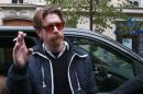 Jesse Hughes, singer of American rock group Eagles of Death Metal, arrives at the Bataclan concert hall in Paris, on November 13, 2016, for a ceremony to mark the first anniversary of terror attacks