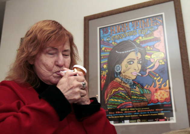 Elvy Musikka, 72, who suffers from glaucoma, lights a marijuana cigarette, one of many she regularly receives from the U.S. Government, at her home in Eugene, Ore., Tuesday, Sept. 27, 2011. For the past three decades, the federal government has been providing a handful of patients with some of the highest grade marijuana around. The program grew out of a 1976 court settlement that created the countrys first legal pot smoker. (AP Photo/Don Ryan)