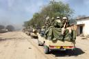 Chadian soldiers patrol in the Nigerian border town of Gamboru on February 4, 2015, after taking control of the city