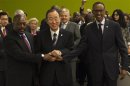 U.N. Secretary General Ban joins hands of Rwandan President Kagame and Congolese President Kabila at a meeting during 67th United Nations General Assembly in New York