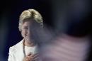 Democratic presidential nominee Hillary Clinton acknowledges applause on stage during the final day of the Democratic National Convention in Philadelphia , Thursday, July 28, 2016. (AP Photo/Paul Sancya)