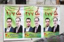 Election posters showing Iraqi Prime Minister Nuri al-Maliki (R) and parliamentary candidate Faleh al-Khazali pictured in the southern port city of Basra, on April 21, 2014