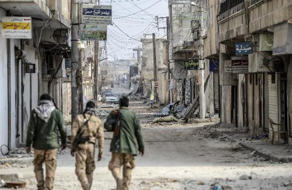 After Kobane's capture, refugees return blocked