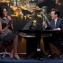In this photo provided by Comedy Central, first lady Michelle Obama laughs with Stephen Colbert during her appearance on Comedy Central's "The Colbert Report" in New York. Obama has been everywhere from a West Point mess hall to a NASCAR speedway in the past year to drum up support for military families through her "joining forces" campaign. On Wednesday, she marked the program's one-year anniversary by taking stock of what's been done and challenging Americans to do even more. (AP Photo/Comedy Central, Kristopher Long)