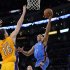 Oklahoma City Thunder guard Derek Fisher, right, puts up a shot as Los Angeles Lakers forward Pau Gasol, left, of Spain, defends and guard Steve Blake watches during the first half of an NBA basketball game, Thursday, March 29, 2012, in Los Angeles. (AP Photo/Mark J. Terrill)