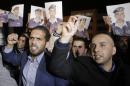 Friends and relatives of Jordanian air force pilot Maaz al-Kassasbeh -- who was captured by Islamic State militants after his plane crashed in Syria on December 24 -- protest near the Prime Minister's office in Amman, on January 27, 2015