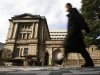 A man walks past in front of the Bank of Japan in Tokyo