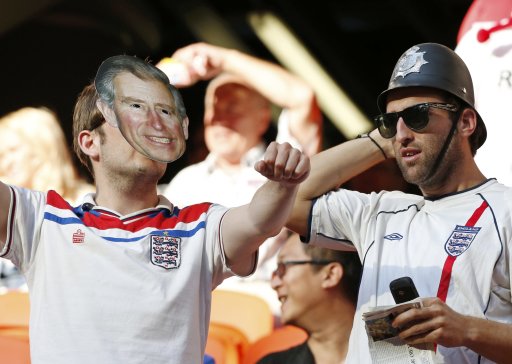 England's soccer fans cheer before the Group D Euro 2012 soccer match against France at Donbass Arena in Donetsk