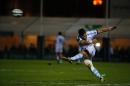 Racing-Metro's New Zeland fly-half Dan Carter kicks the ball during the European Cup rugby union match between Racing Metro 92 and Northampton Saints on December 12, 2015, at Colombes, outside Paris