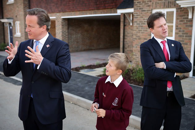 David Cameron is watched by …