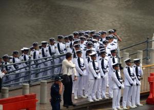 Members of a guard of honour prepare before a funeral …