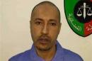 Handout photo shows Saadi Gaddafi, son of Muammar Gaddafi, inside a prison in Tripoli