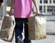 <p>               FILE - In this March 12, 2012 file photo, a shopper carries bags of merchandise in Freeport, Maine. U.S. retail sales rose at a solid pace in March 2012, as a healthier job market encouraged more consumers to shop, the Commerce Department said Monday, April 16, 2012. (AP Photo/Pat Wellenbach, File)