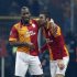 Galatasaray's Yilmaz celebrates his goal against Schalke 04 with team mate Drogba during their Champions League soccer match in Istanbul