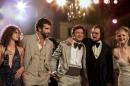 This film image released by Sony Pictures shows, from left, Amy Adams, Bradley Cooper, Jeremy Renner, Christian Bale and Jennifer Lawrence in a scene from "American Hustle." The film was nominated for an Academy Award for best picture on Thursday, Jan. 16, 2014. The 86th Academy Awards will be held on March 2. (AP Photo/Sony - Columbia Pictures, Francois Duhamel)