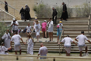 In this July 6, 2015 photo, Christian visitors soak&nbsp;&hellip;