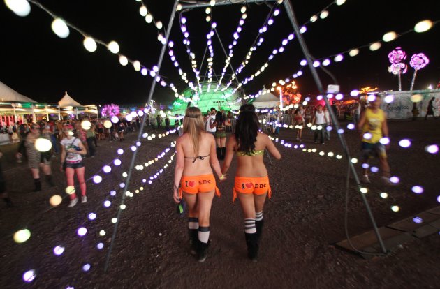 Revellers walk through an art installation during the Electric Daisy Carnival in Las Vegas