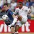 France's Nasri challenges England's Cole during their Group D Euro 2012 soccer match at the Donbass Arena in Donetsk