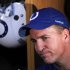 In this Dec. 2, 2011 file photo, Indianapolis Colts quarterback Peyton Manning talks to reporters in the locker room at the NFL football team's practice facility in Indianapolis. (AP Photo/Michael Conroy, File)