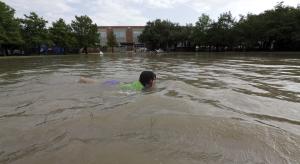 Joselyn Ramirez swims in a flooded school playground &hellip;