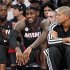 Heat's James reacts next to Wade and Battier during their loss to the Knicks in New York