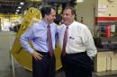 FILE - In this Sept. 29, 2014 file photo, New Jersey Gov. Chris Christie, right, and Wisconsin Gov. Scott Walker share a laugh as Walker campaigns at Empire Bucket in Hudson, Wis. Let's say that America has given you the job of picking the perfect candidate for president. There are all sorts of things to start the list: leadership, vision, charisma, communication skills and foreign policy cred. And more: fundraising prowess, authenticity, empathy, a keen understanding of the presidency and maybe a little familiarity with running for the office. Walker, Christie and former Florida Gov. Jeb Bush are among at least 10 current and former governors considering a bid.(AP Photo/Ann Heisenfelt, File)
